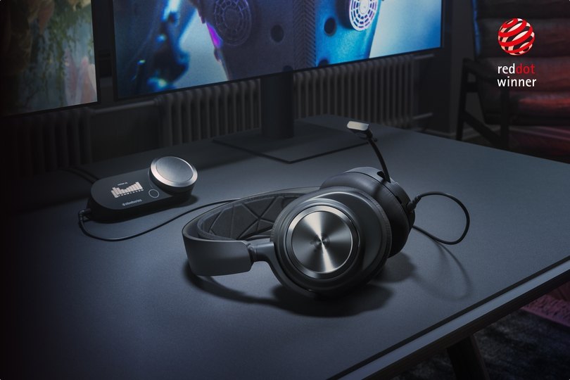 An Arctis Nova pro hoovering above the desk and gaming setup.