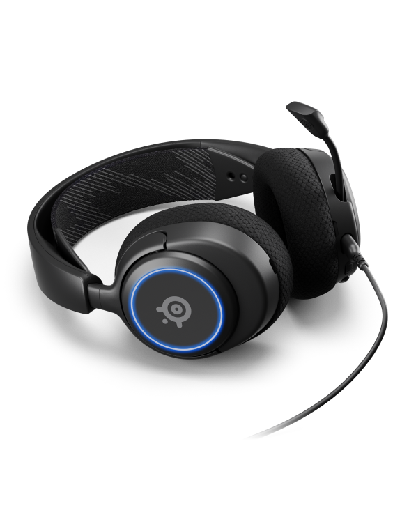 
 An Arctis Nova 3 headset laying on a surface with the mic extended.
 